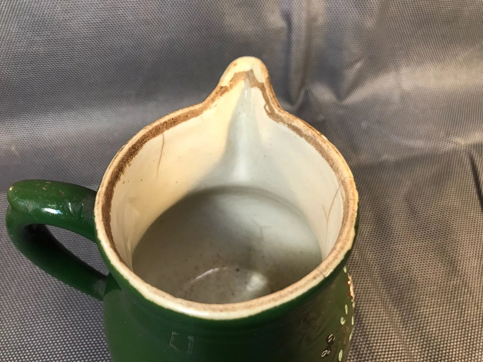 Old small ceramic teapot from St Uze with painted enamel decoration Revol