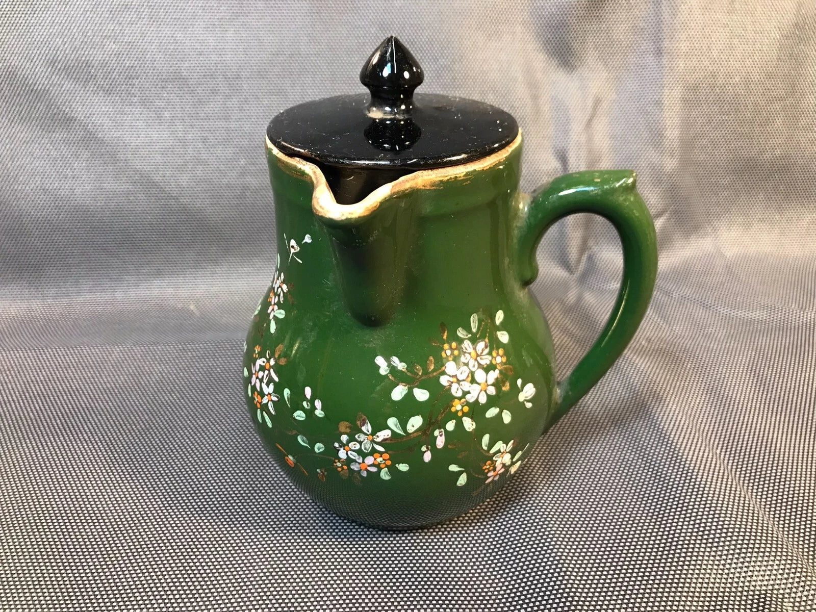 Old small ceramic teapot from St Uze with painted enamel decoration Revol
