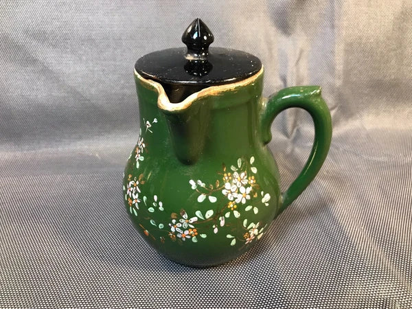 Old small ceramic teapot from St Uze with painted enamel decoration Revol