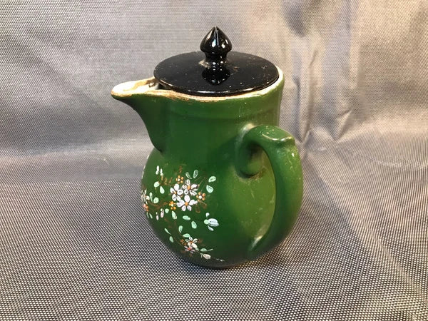 Old small ceramic teapot from St Uze with painted enamel decoration Revol