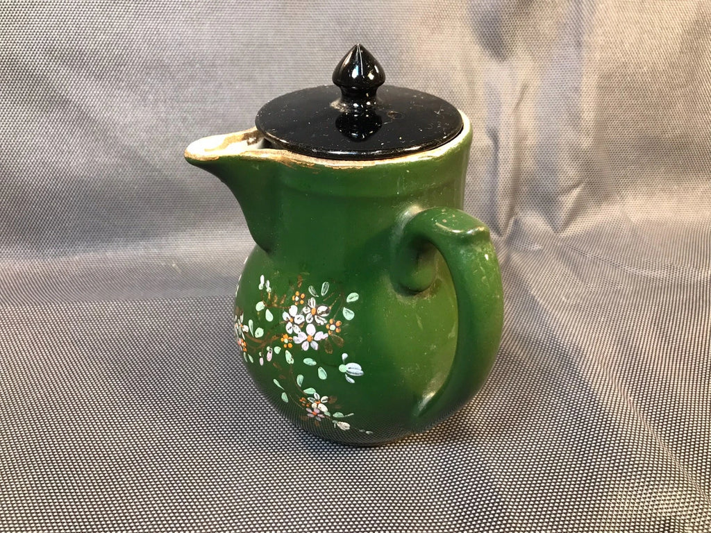 Old small ceramic teapot from St Uze with painted enamel decoration Revol
