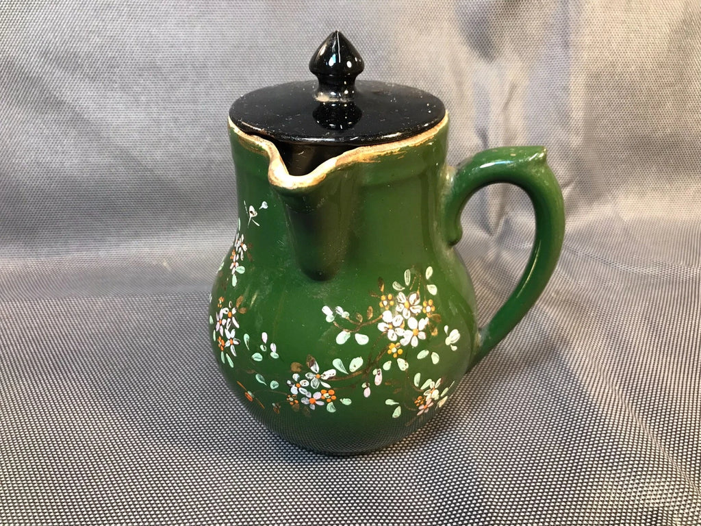 Old small ceramic teapot from St Uze with painted enamel decoration Revol