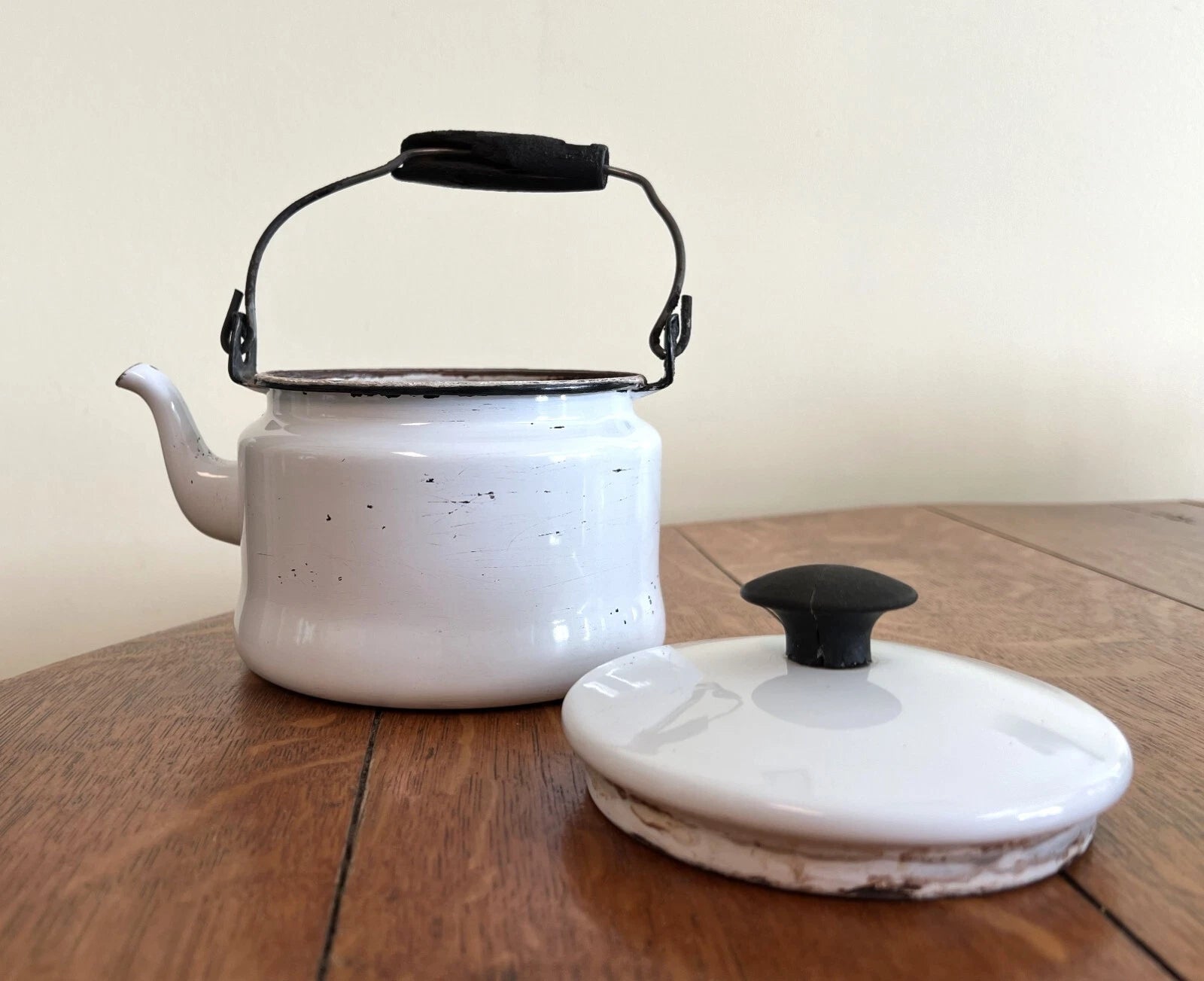 Antique White & Black Enamelware Tea Kettle with Black Wooden Handle