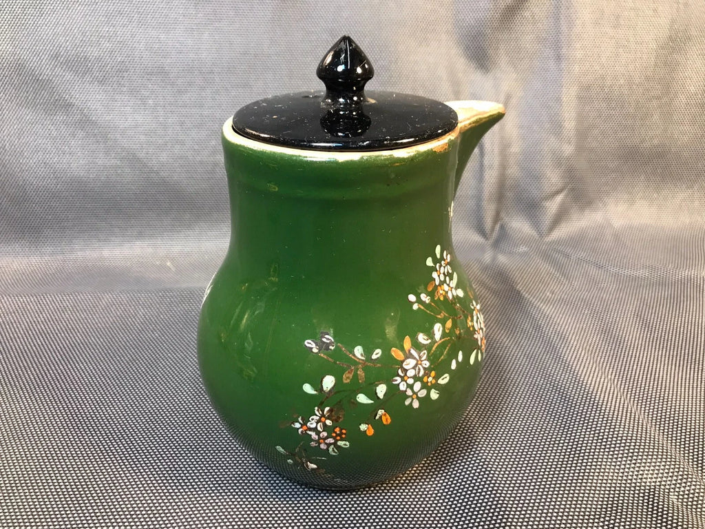 Old small ceramic teapot from St Uze with painted enamel decoration Revol