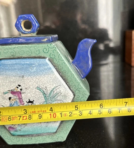 Chinese Enameled Yixing Pottery Teapot With Figures And Seal Mark